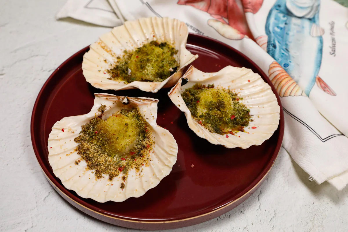 capesante-gratinate-arancia-pistacchi