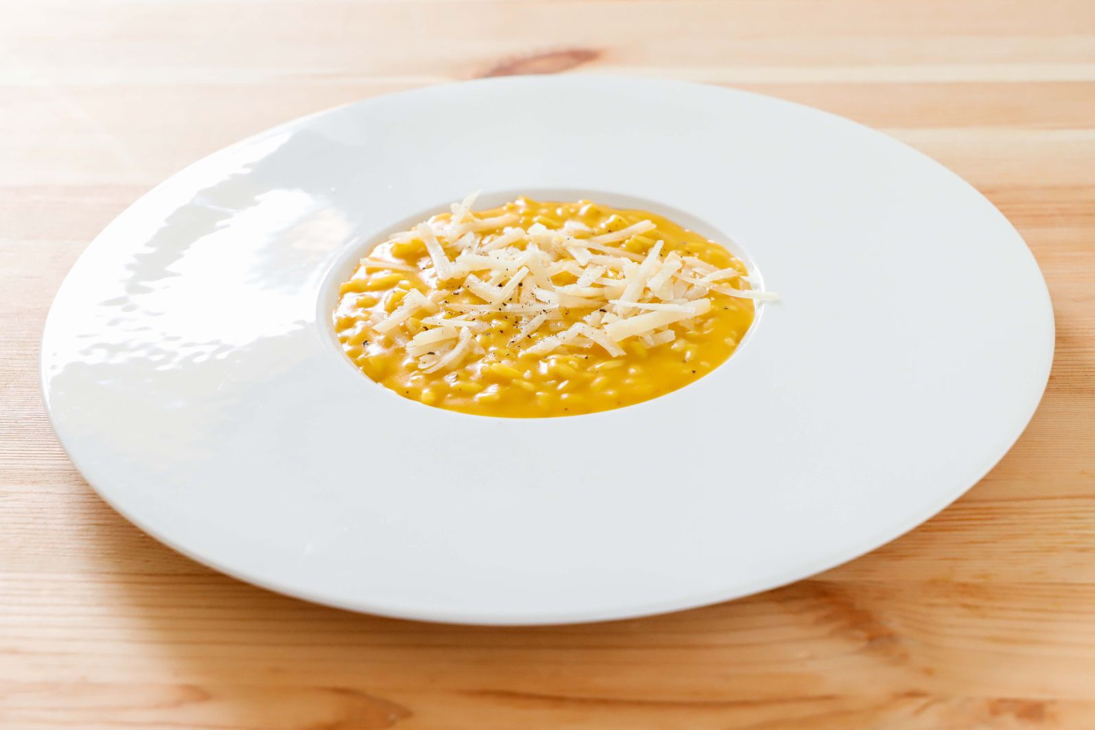 risotto-con-la-zucca-e-scaglie-di-Grana-Padano-image