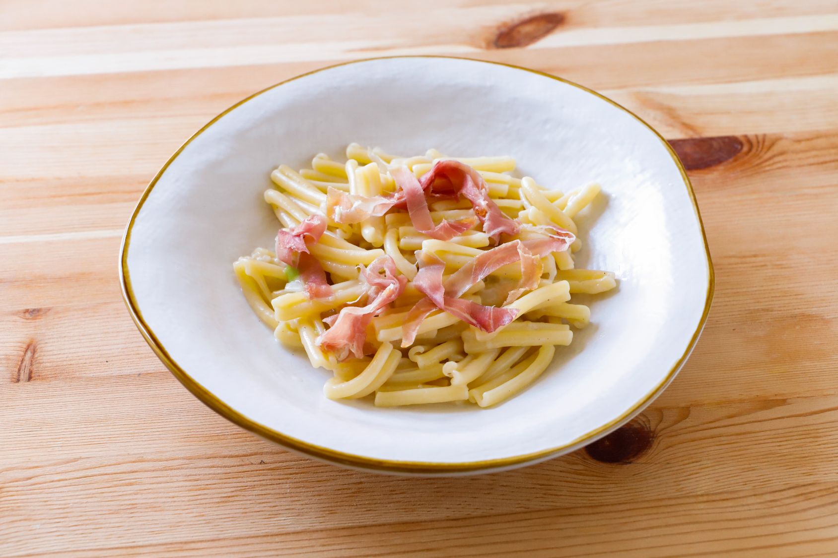 caserecce-con-cipollotto-e-prosciutto-crudo-di-norcia-image